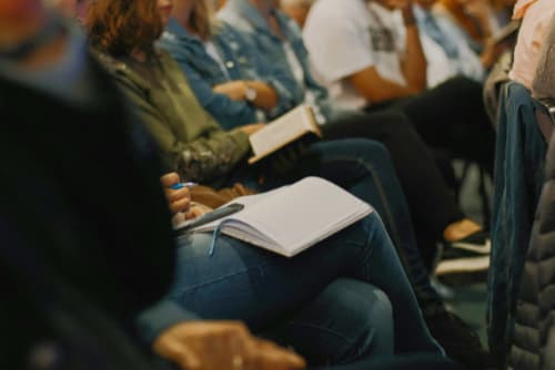 Photo of students sitting in a lecture theatre